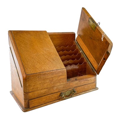 Lot 70 - A late Victorian oak stationery cabinet.