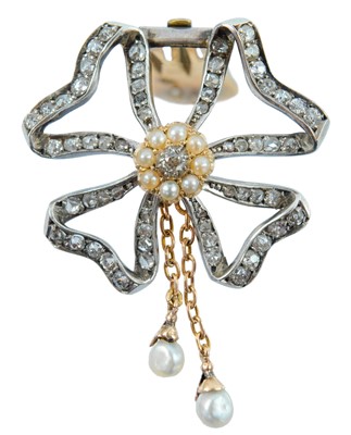 Lot 22 - A Belle Epoque diamond and seed pearl ribbon bow brooch
