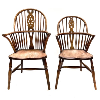 Lot 84 - A near matching pair of elm, beech and ash windsor armchairs, circa 1900.