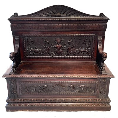 Lot 93 - A Victorian carved oak hall bench.