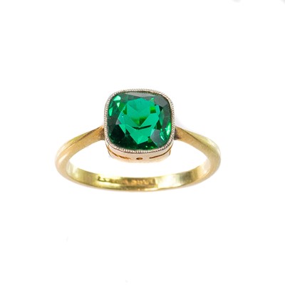 Lot 78 - An 18ct gold green garnet stone set ring.