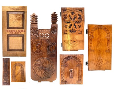 Lot 115 - Seven carved oak panels by David Greenacre.