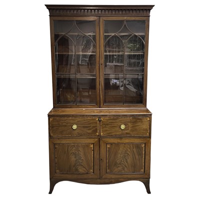 Lot 1808 - A George III mahogany and satinwood banded secretaire bookcase.