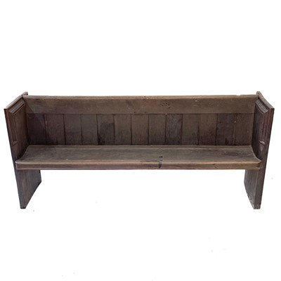 Lot 143 - An oak church pew, circa 1900.
