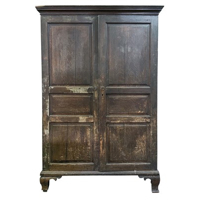 Lot 166 - A George III oak wardrobe.