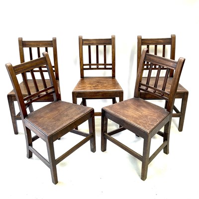 Lot 176 - A set of five George III fruitwood and elm dining chairs,.