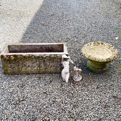 Lot 612 - A reconstituted stone rectangular planter with...
