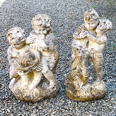 Lot 624 - A reconstituted stone fountain of putti...