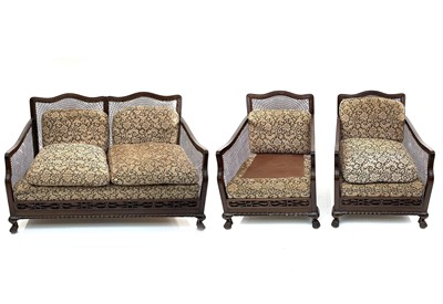 Lot 1892 - A walnut framed three piece Bergere suite.