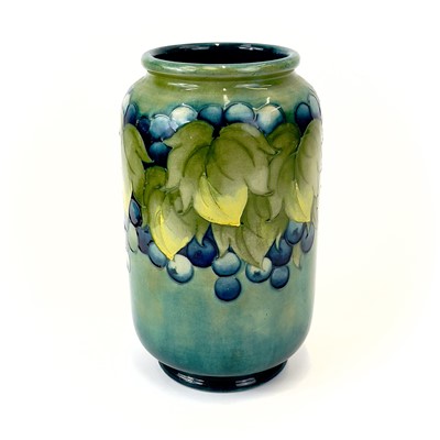 Lot 897 - A Moorcroft 'Leaf and Berry' pattern vase.