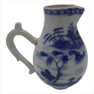 Lot 1132 - A Chinese blue and white export porcelain jug,...