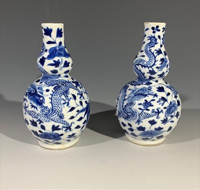 Lot 1133 - A pair of Chinese blue and white double gourd...