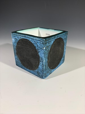 Lot 1328 - A Troika cube vase, the blue body with black...