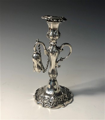 Lot 2033 - An early Victorian engraved silver taper stick...