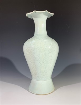 Lot 1137 - A celadon baluster vase, 20th century,...