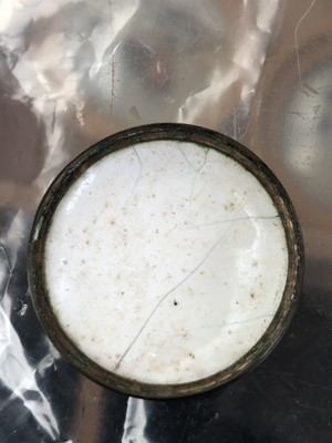 Lot 22 - A South Staffordshire or Battersea enamel circular patch box.