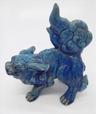 Lot 1152 - A Japanese blue glazed pottery shi shi dog