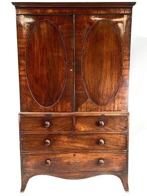 Lot 1926 - A George III mahogany linen press.