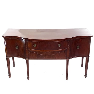 Lot 1889 - An Edwardian mahogany bow front sideboard.