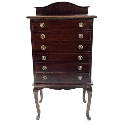 Lot 1870 - An Edwardian mahogany music cabinet.
