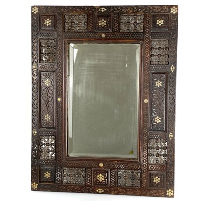 Lot 1029 - A Syrian hardwood wall mirror, 19th century.