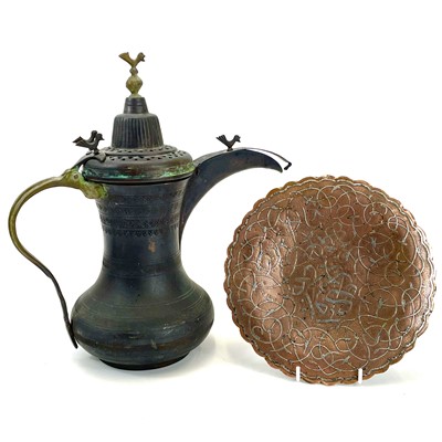 Lot 1053 - An early 20th century Dallah pot with bird finials.