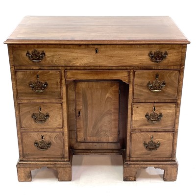Lot 1815 - A George III mahogany kneehole gentleman's dressing table/writing desk.