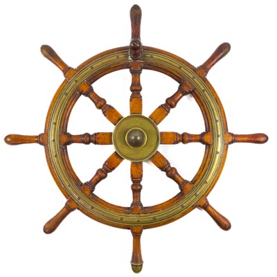 Lot 485 - A brass mounted teak eight spoke ship's wheel.