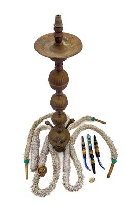 Lot 56 - A tall pierced Indian brass hookah.
