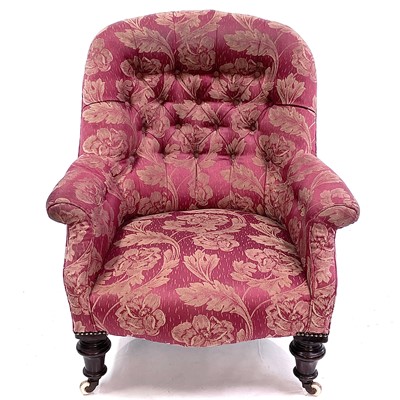 Lot 1897 - A mid-Victorian walnut framed button back armchair.