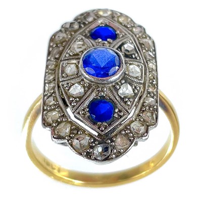 Lot 3 - A stylish Art Deco period 18ct yellow and white gold diamond and sapphire panel ring.