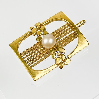 Lot 434 - A modernist silver rose quartz set pendant, and a gold plated pendant by Kordes & Lichtenfels.