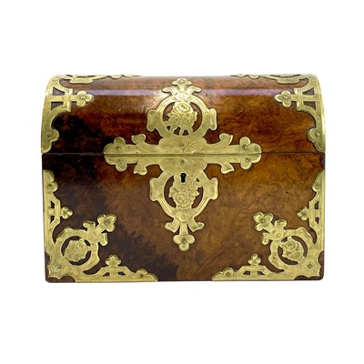 Lot 39 - A Victorian burr walnut and brass dome top casket.