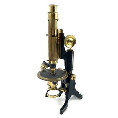 Lot 85 - A lacquered brass and brass Petrological microscope by J Swift & Sons early 20th century.