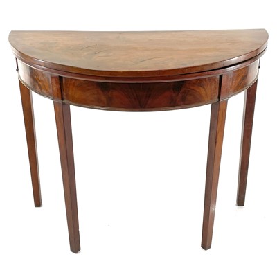 Lot 1929 - A George III mahogany half round fold top card table.
