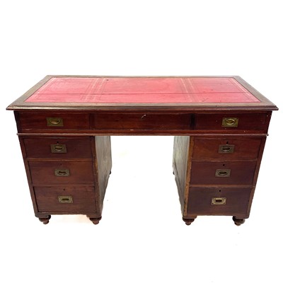 Lot 1878 - A late Victorian teak campaign style pedestal desk.