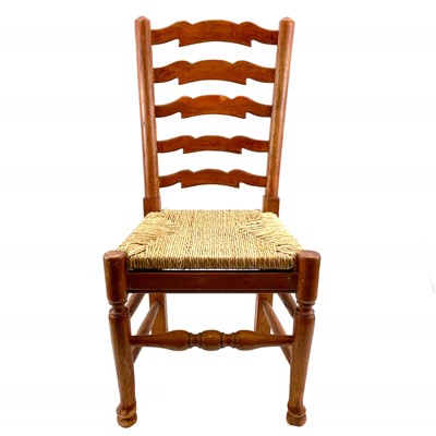 Lot 1806 - An Arts and Crafts style ash and elm ladder back child's chair.