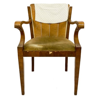 Lot 1891 - An Art Deco walnut upholstered armchair.