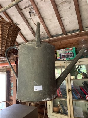 Lot 68 - Watering cans, baskets and a galvanized trug.