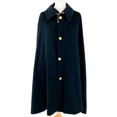 Lot 440 - A Royal Navy Officers' boat cape with brass buttons, lion mask cape buttons and chain.