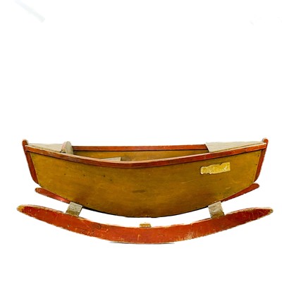 Lot 44 - A child's rocking boat.