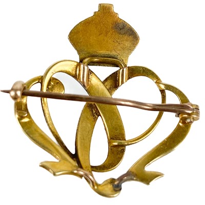Lot 73 - An Edwardian high purity gold, enamel and seed pearl set '1902' coronation brooch.