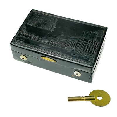 Lot 42 - A French pressed horn pocket music box.