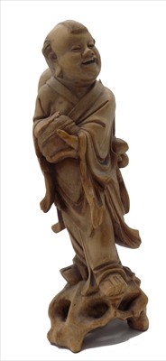 Lot 1171 - A Chinese carved wood figure of a laughing man...