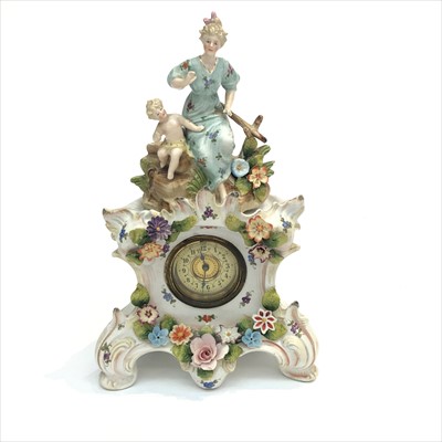 Lot 3032 - A German porcelain eight day timepiece, late...