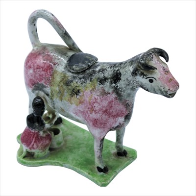 Lot 1393 - An early 19th Century Yorkshire pottery cow...