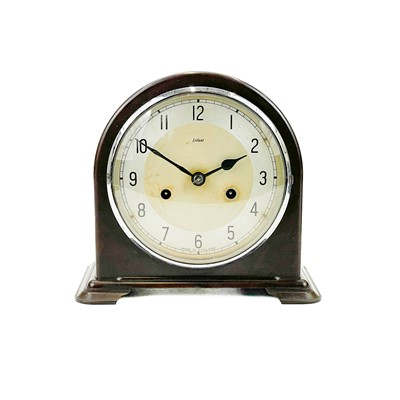 Lot 1703 - An Art  Deco Enfield Bakelite dome top mantel clock.