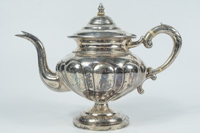 Lot 7 - A Chinese silver teapot, circa 1900.