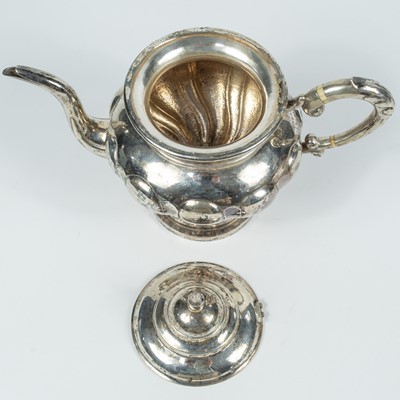 Lot 7 - A Chinese silver teapot, circa 1900.