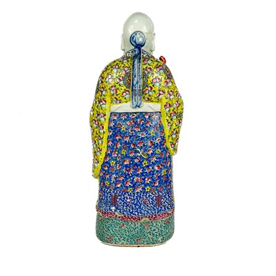 Lot 16 - Three Chinese famille rose porcelain figures of The Immortals, 20th century.